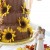 Wedding cake with sunflowers and cake-topper