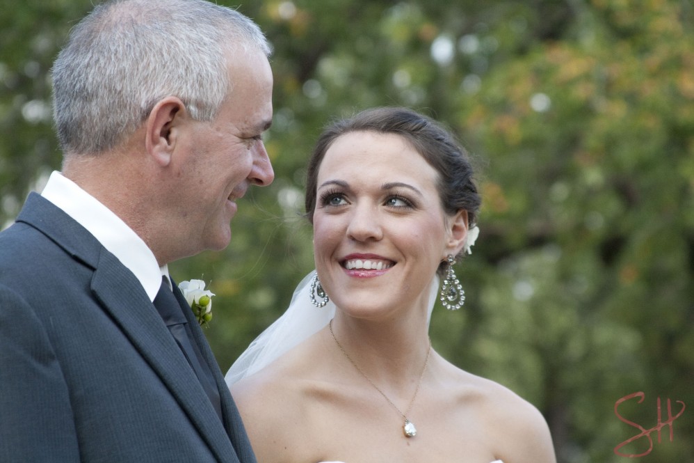 Bride looking at her father