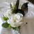 Duck feather and rose boutonniere